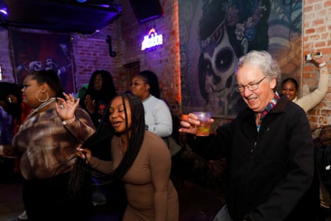 People dance at the Huge Ass Cantina on Bourbon Street, after the opening of the street in New Orleans, Louisiana. Photograph: Octavio Jones/Reuters