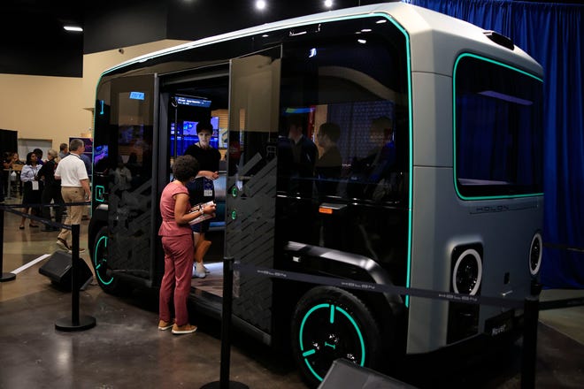 Lena Kleinschmidt of Holon speaks to curious attendees of the inaugural National Autonomous Vehicle Day hosted by the Jacksonville Transportation Authority and JTA on May 31, 2023. The event showcased a wide variety of vehicles made both in the U.S. and abroad. Holon is made abroad.