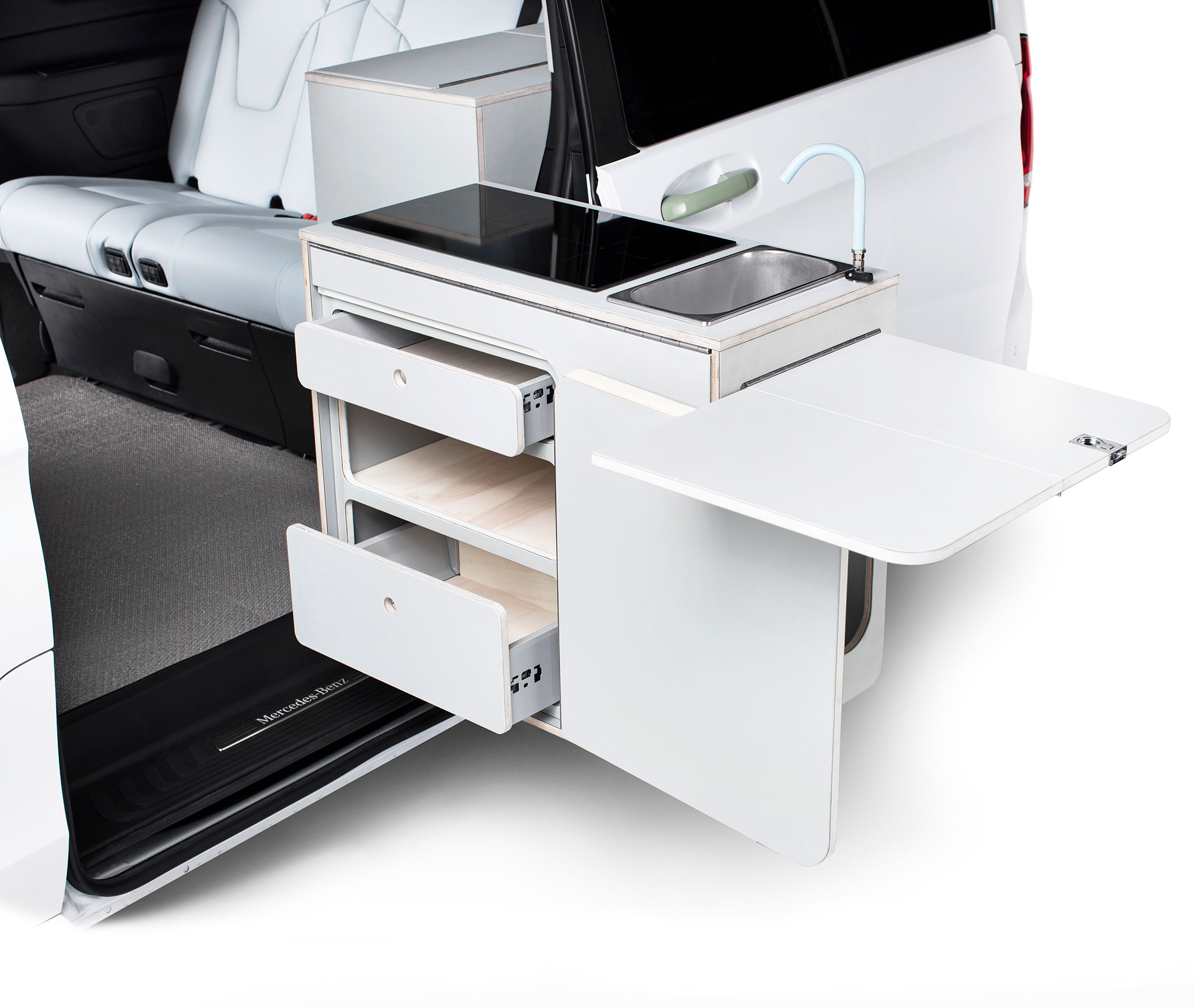 Slide out kitchen module in the Tonke EQV Touring