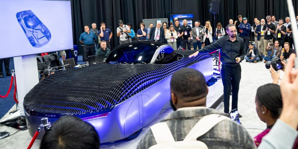 CEO Jim Dukhovny introduces the Model A electric flying car at the Detroit Auto Show