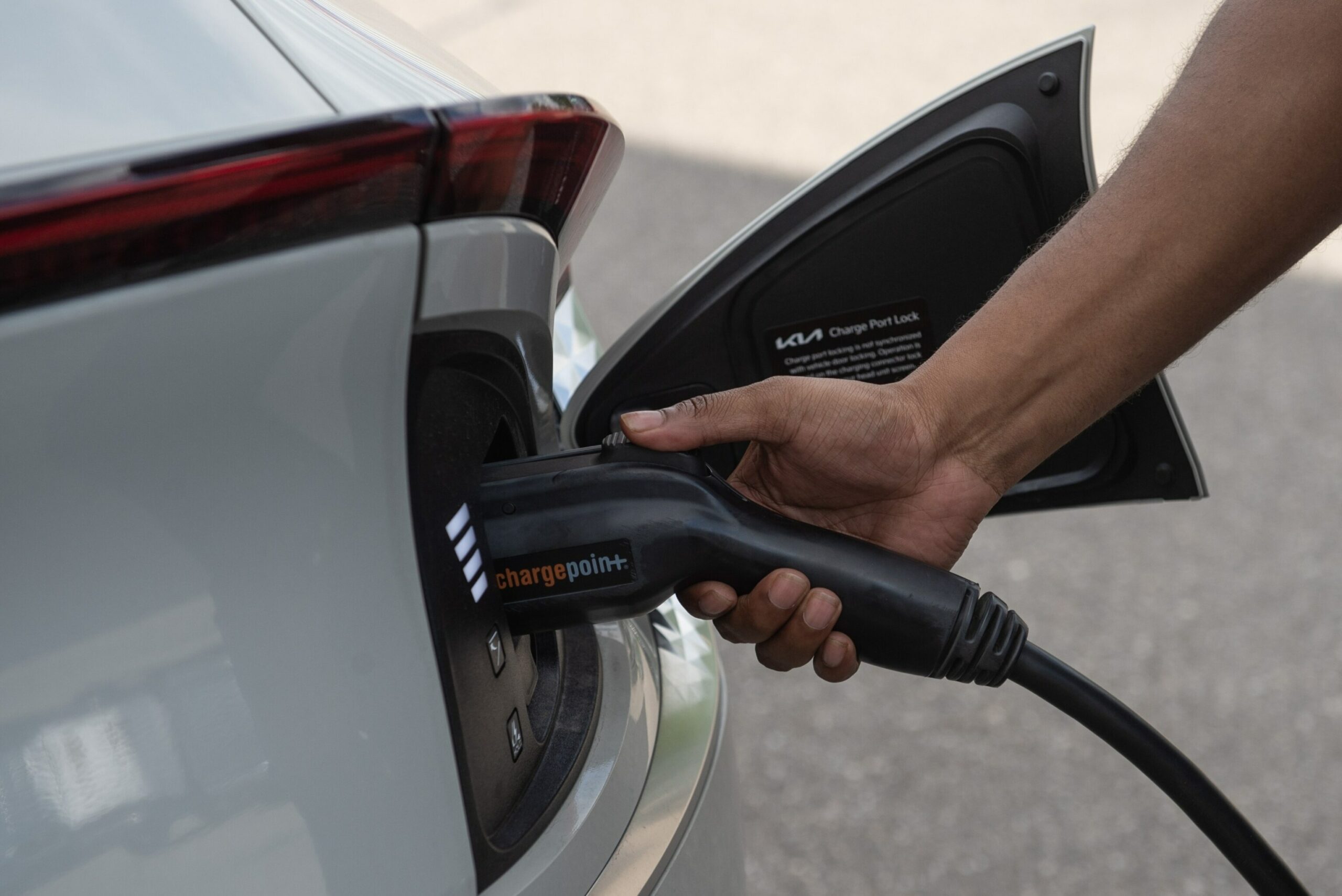 A Kia EV6 electric vehicle (EV) is charged at the Lafontaine Kia dealership in Detroit, July 13, 2023.